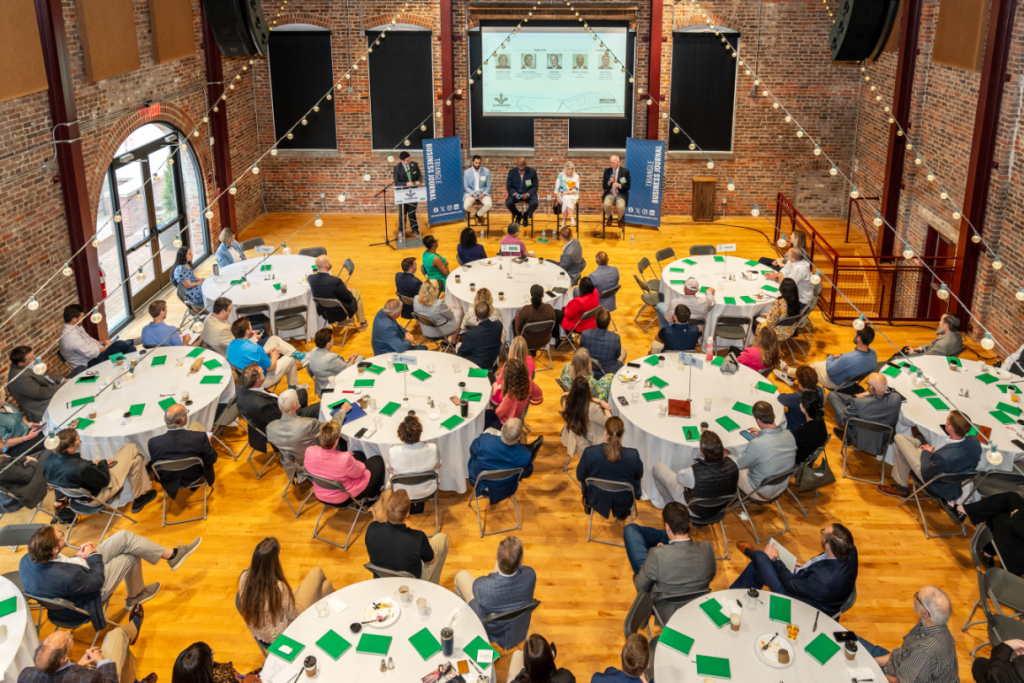 A business panel conference at the Power House corporate event venue.